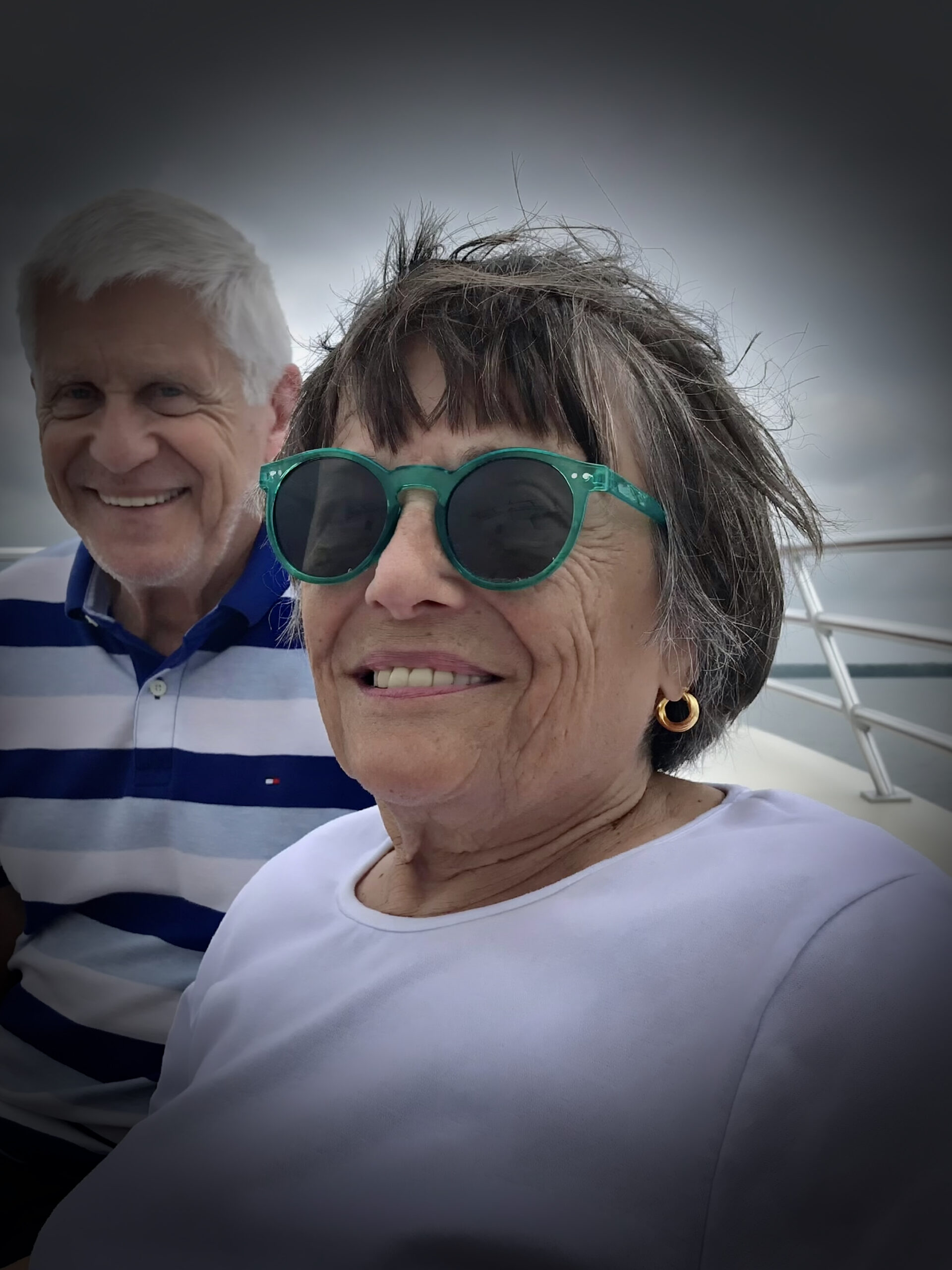 Photo of Connie Hart and her husband on a boat